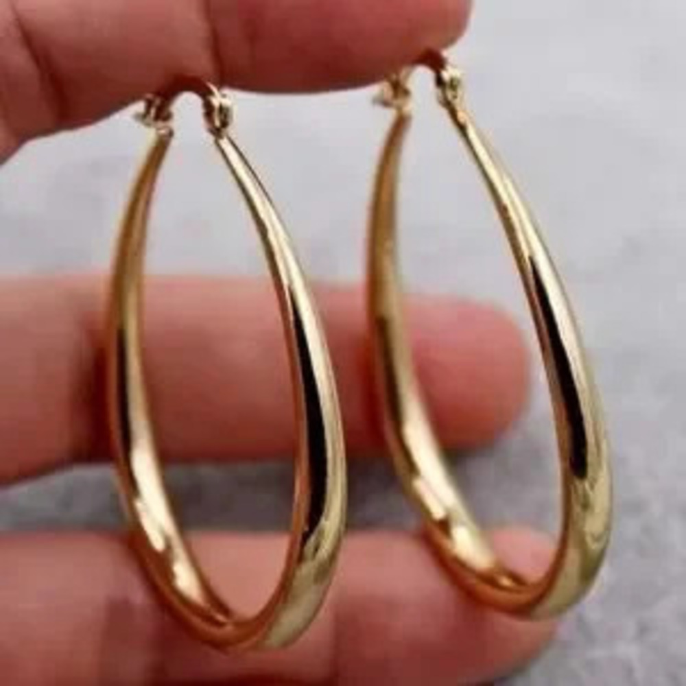 Smooth Gold Oval Hoop Earrings - Picture 2 of 5